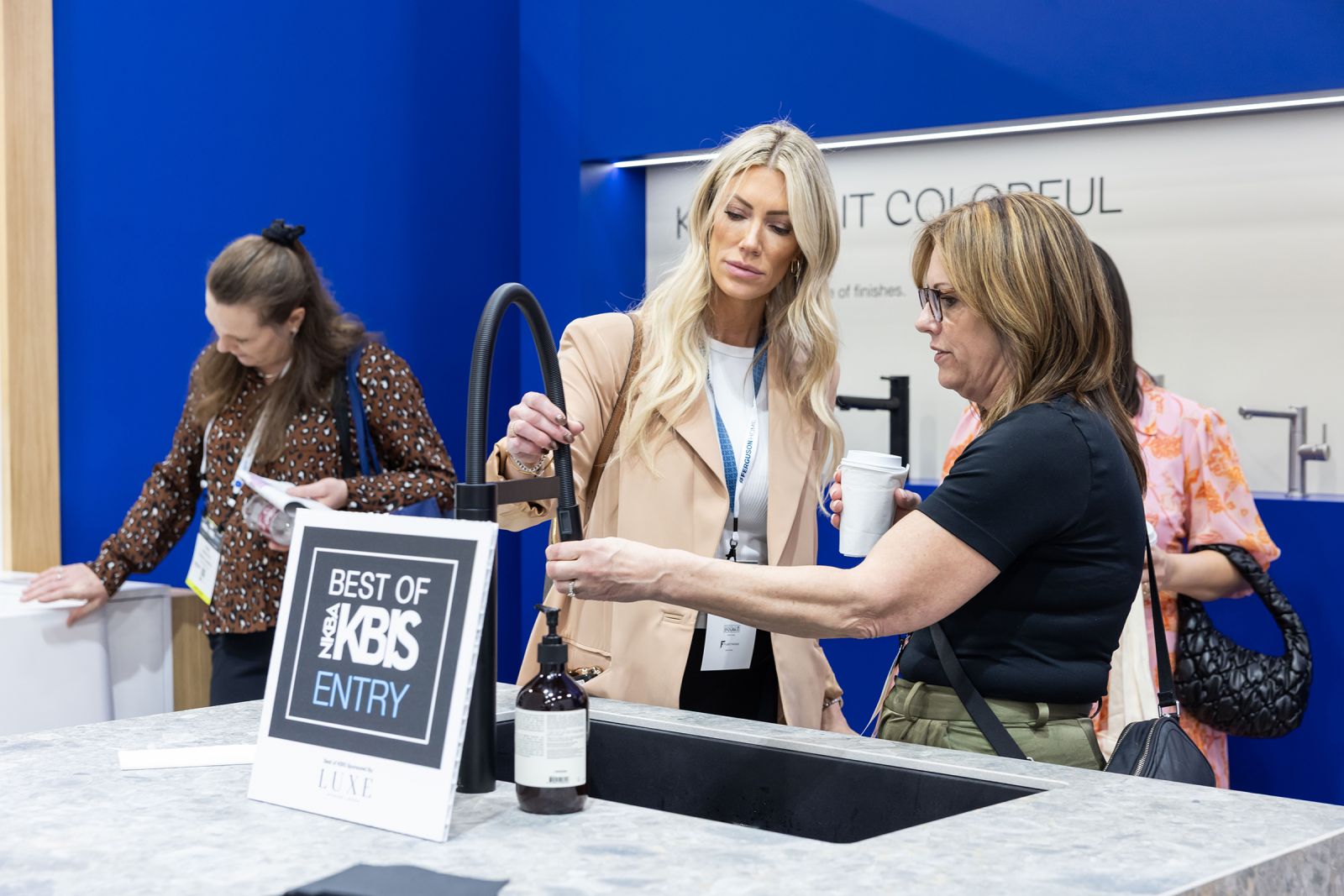 BLANCO demonstrates a faucet at 2025 KBIS show