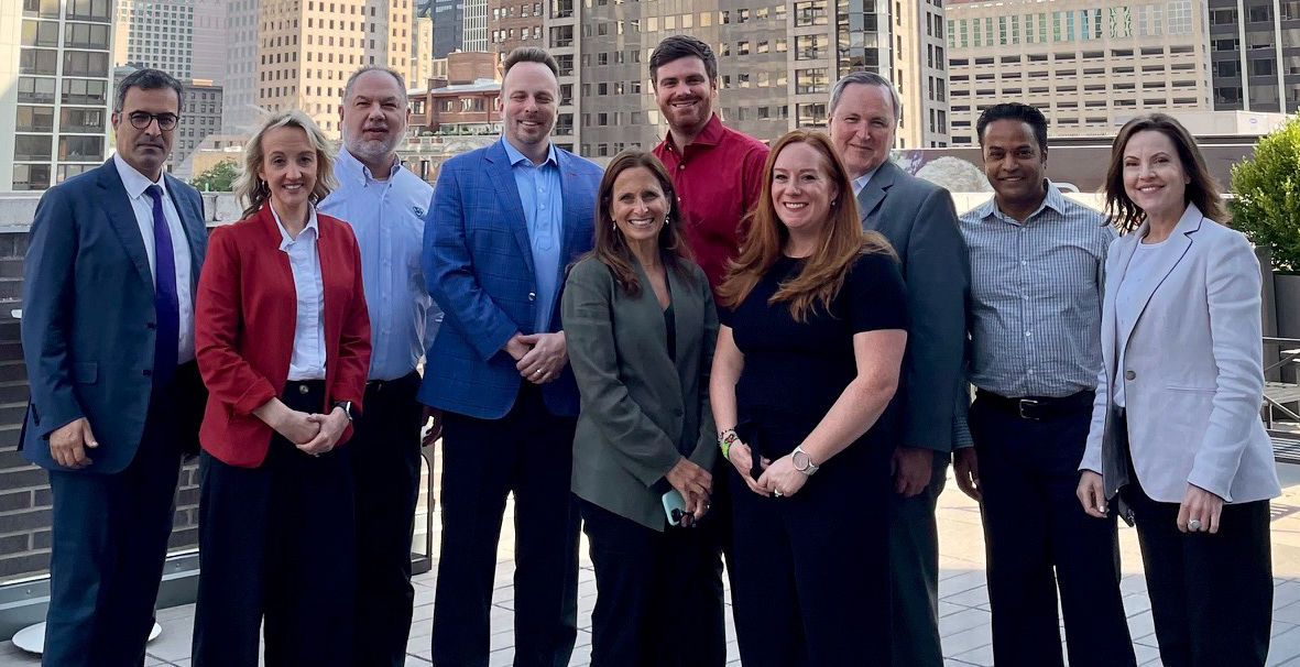 group photo of 8 attendees outside