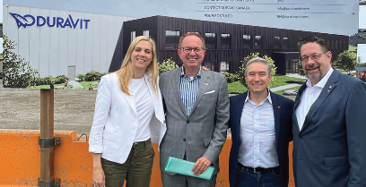 people standing in front of a Duravit facility